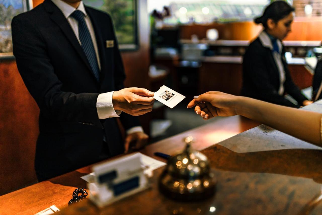 Rahat Palace Hotel Алма Ата Екстериор снимка A hotel key card