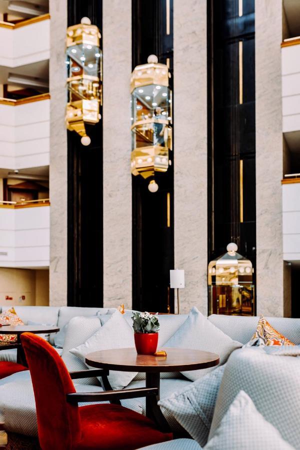 Rahat Palace Hotel Алма Ата Екстериор снимка The interior of the hotel