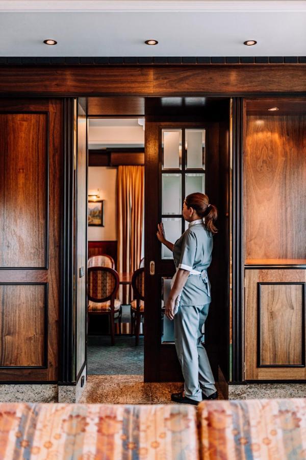 Rahat Palace Hotel Алма Ата Екстериор снимка A hotel maid in Nairobi, Kenya