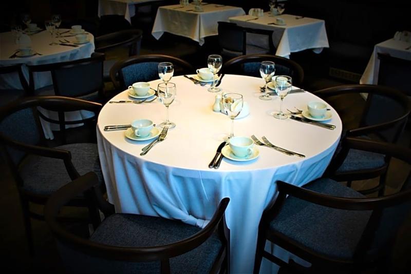 Rahat Palace Hotel Алма Ата Екстериор снимка A table set for a meal