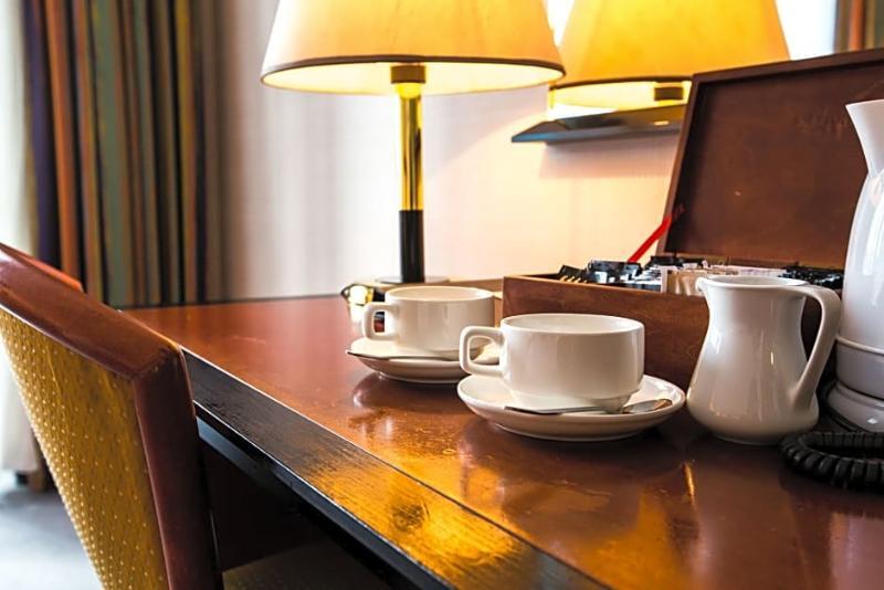 Rahat Palace Hotel Алма Ата Екстериор снимка A tea tray in a hotel room